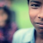 A young boy enjoying time with friends after school.