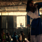 A girl puts on a dance performance at the educational club.