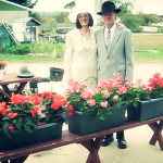 Martina and her husband Jimmy model vintage clothes outside their home in Traverse City, Michigan.